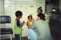 2000 - Chris Hogge with children at J.B.Martin party