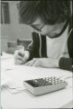 Young man writing, 1978