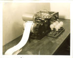 Electric machine with a roll of paper for printing in a laboratory, The University of Iowa, 1939