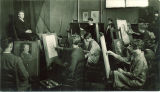 Students painting a portrait of a woman model in the Art Building, The University of Iowa, 1930s