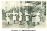Women in elf costumes at a June celebration, The University of Iowa, 1920