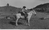 Mr. Snyder, typical cowboy, on the ranch of Payne and Arnold, Minnekahta, S.D.,  late 1890s or early 1900s