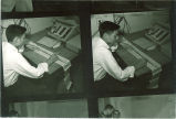 Physics student working with data, The University of Iowa, 1960s