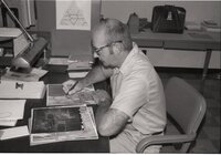 1975 Soil scientist Mel_Brown  looks at aerial photos