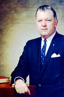 John E. Reich