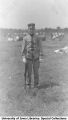 Cadet standing with rifle, The University of Iowa, 1912