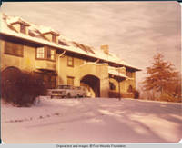 View of cars in car port in Winter