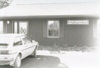 Unidentified car parked in front of Plant Materials Center