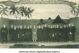 Students posed in front of theatrical backdrop, The University of Iowa, 1917