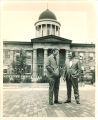 Old Capitol restoration consultants, Don Ferry and Wally Henderson, in front of the Old State Capitol of Illinois, the University of Iowa, December 11, 1972