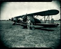 0033_ Howard Campbell in front of Plane