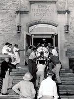 Carrying an Iron Lung into Luthern Hospital 