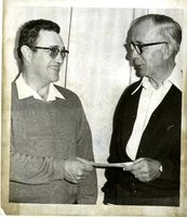 Allen White receives check from C.I. Heady