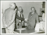 Earl O. Heady being shown research equipment in Hungary, 1979