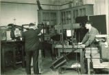 Student and instructor in Physics laboratory, The University of Iowa, 1930s