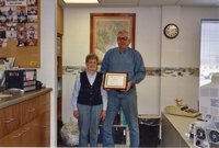2001 Holly and Kay Wagner hold award as Cooperator of the Year winners.