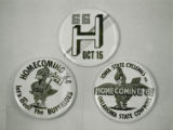Three Homecoming buttons, 1966