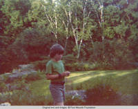 John, Jr. walking in Rock garden
