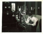 Engineering student working in a technology laboratory, The University of Iowa, 1939