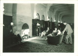 Lounging near a fireplace in the Iowa Memorial Union, the University of Iowa, July 1929