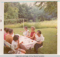 Heitzmans gathering at table