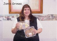 Staff holding doughnuts