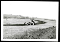 Onlookers watch as Tractors Plows at Dallas Davis Farm