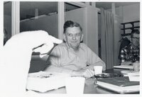 1970's Commissioners Dwight Stucker and Clyde Sherer sit at a meeting