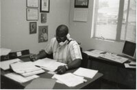 Terry Cosby, district conservationist, works at his desk