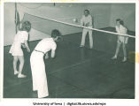 Students playing badminton, The University of Iowa, 1930s