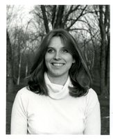 Woman Smiling Among Trees