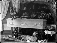 CC 102  Coffin with flowers