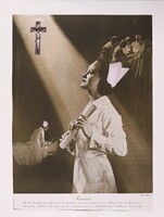 Nurse looking at cross