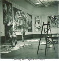 Students painting modern art mural, The University of Iowa, March 1940