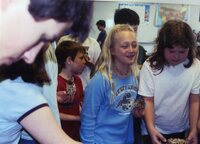 Students make pine cone bird feeders