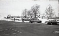 1970's Shoveling snow in parking lot