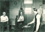 Sidney Dickinson painting a man's portrait, The University of Iowa, 1910s