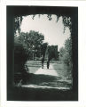 Students walking in the courtyard at Quadrangle, The University of Iowa, April 1905