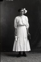 Woman with diploma and book
