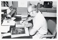 1975 Soil scientist Mel_Brown  looks at aerial photos