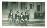 Scottish Highlander members on steps of Old Capitol, The University of Iowa, June 1939