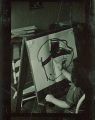 Girl painting picture in preschool, The University of Iowa, February 22, 1938