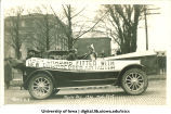 Touring car in Mecca Day parade, The University of Iowa, 1920