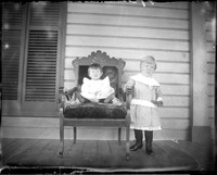 UP466 Two children on porch