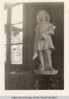 Statue in Grey house
