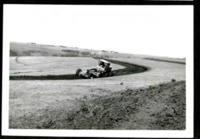 Onlookers watch as Tractors Plows at Dallas Davis Farm