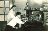 Men working in a laboratory, The University of Iowa, 1930s