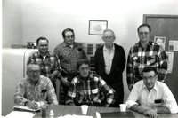 1984 - Seven Soil Conservation District Commissioners and Assistants Pose for Photograph in December 1984