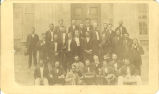 Iowa dentists posed on steps of Old Capitol, The University of Iowa, June 10, 1870