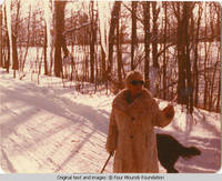 Elizabeth walking Sadie in winter